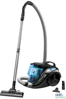 a black and blue vacuum cleaner with a hose