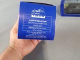 a person holding a blue box with a picture on it