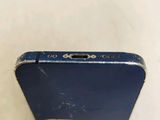 a close up of a cell phone with a broken screen