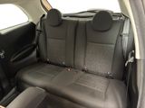 the back seats of a car are black in color