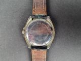 an image of a watch sitting on top of a table