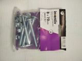 a package of screws and nuts on a table