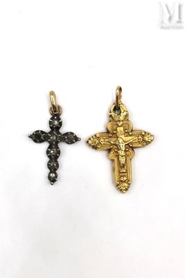 two gold and black diamond cross pendants