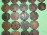 a lot of coins that are on a green surface