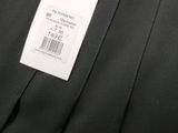 a close up of a black dress with a tag on it