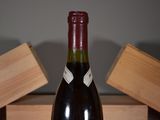 a bottle of wine that is sitting on a table