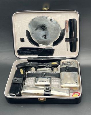 a suitcase with a lot of items inside of it