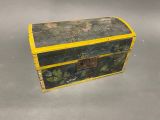 a small wooden box with a yellow handle