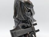 an image of a statue of a woman holding a guitar