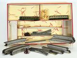 a box with a train set in it on a table