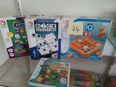 many different games on the glass table in the room