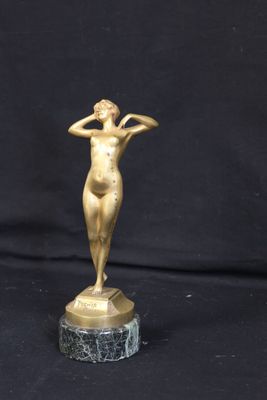 bronze statue of a woman holding her head on a marble base