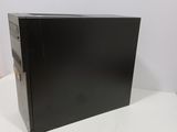 the computer is sitting on a white table with a white background