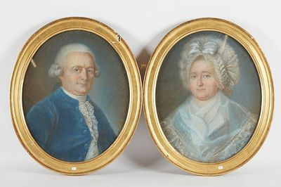 une paire de portraits miniatures représentant un homme et une femme