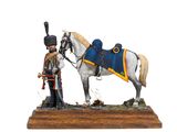 figurine représentant un soldat à cheval, posée sur un socle en bois
