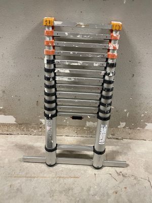 a close up of a ladder on a concrete floor in a room