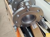 a picture of a metal flanged valve in a box