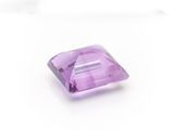 a purple amethorate stone on a white background