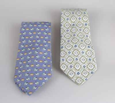 pair of two neck ties on a white background