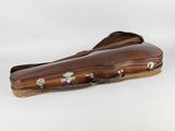 a wooden case that is sitting on a white surface
