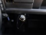 a close up of a car ' s gear shift handle