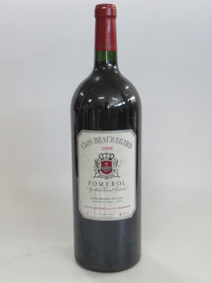 a bottle of wine that is sitting on a table