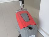 an image of a floor scruber in a clean room