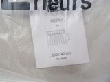 a label on a white shirt that says rideau