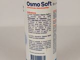 a bottle of osmo soft on a white surface