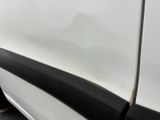 a white car with a black stripe on the side of it