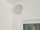 a picture of a white ceiling with a light on