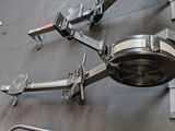 a gym equipment hanging on the wall in a gym