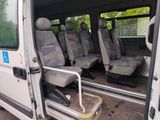 a white van with four seats in the back of it