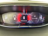 the dashboard of a car with a digital display in the center