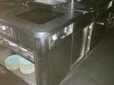 an image of a kitchen with a stove and a sink