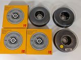 four different types of grinding wheels on a white surface