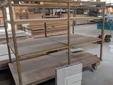 a large room with a lot of shelves and pallets in it