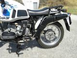 a motorcycle that is parked on the side of the road