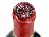 a close up of a bottle of wine on a table