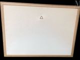 a picture of a white board with a triangle on it