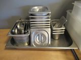 a tray with a lot of metal containers on it