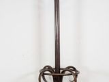 an image of a coat stand with a coat rack on top of it