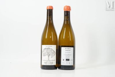 two bottles of wine sitting next to each other on a white surface