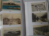 a book opened to show pictures of a city