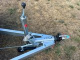 a close up view of a trailer with a motor on it