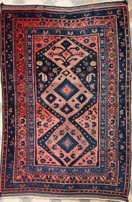 a rug with a blue and red design on it