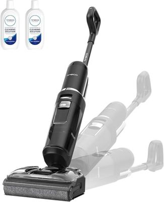 une photo en noir et blanc d'un aspirateur sans fil