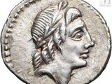 a close up of a coin with a woman ' s head on it