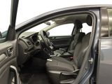 the interior of a car with the door open and the driver ' s seat down