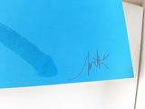 a picture of a blue card with a feather on it